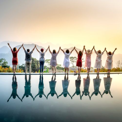 Person celebrating with arms outstretched